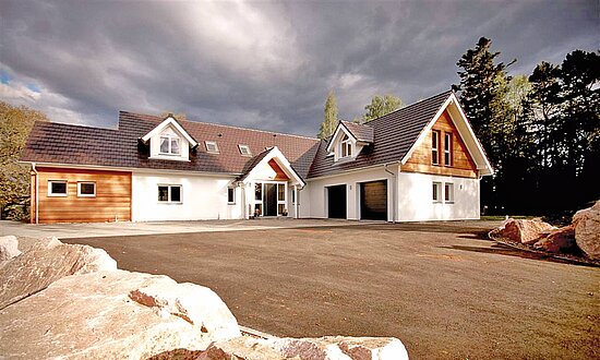 Glass-fronted timber frame home in Scotland