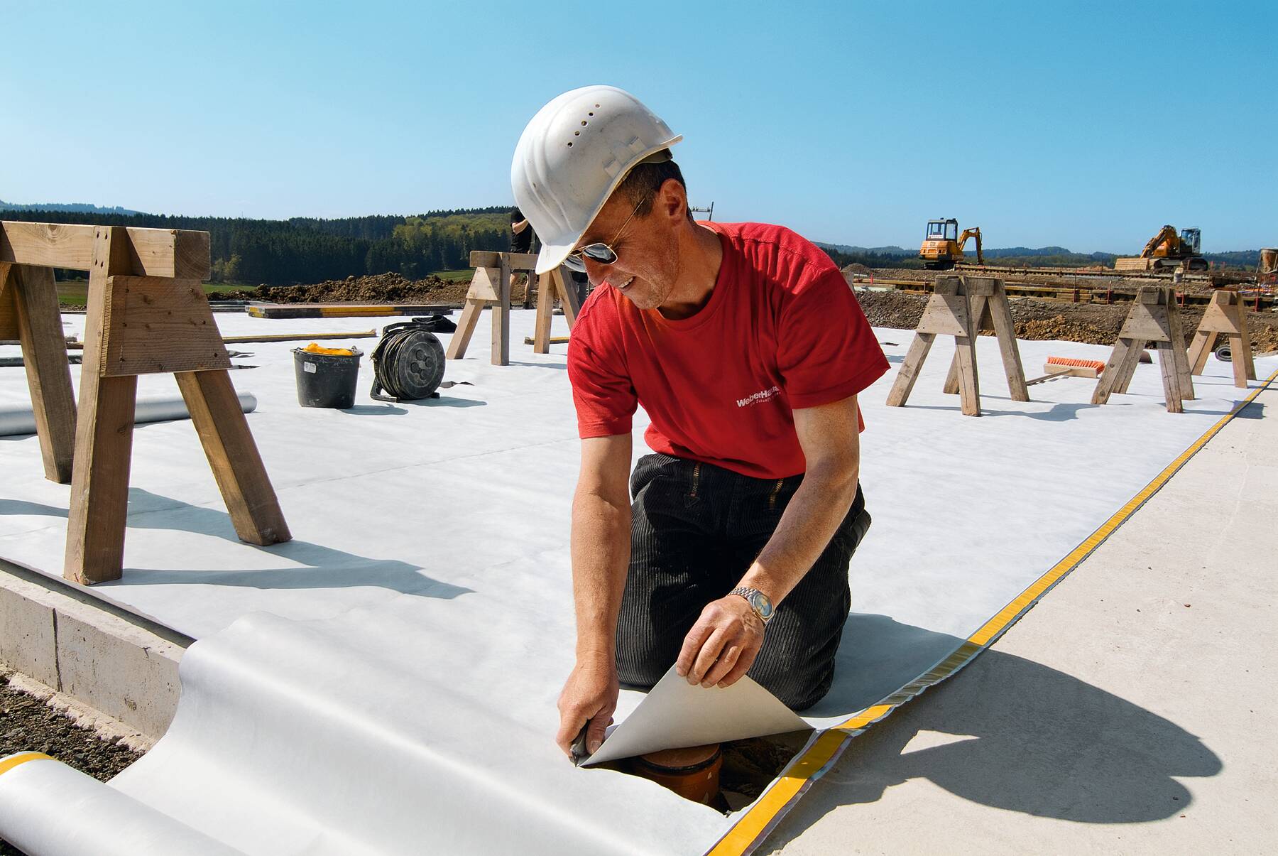 WeberHaus Monteur auf der Baustelle